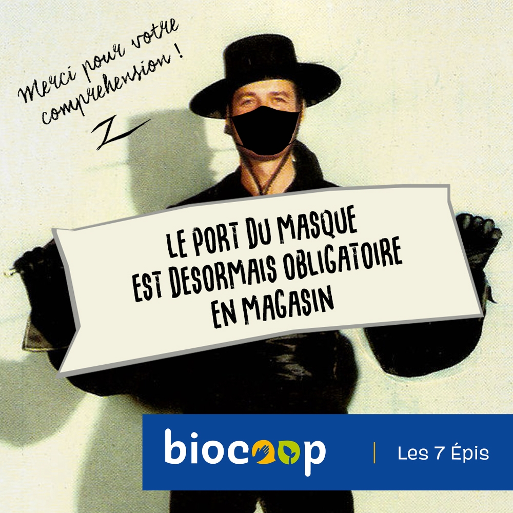 zorro porte un panneau pour promouvoir le masque obligatoire